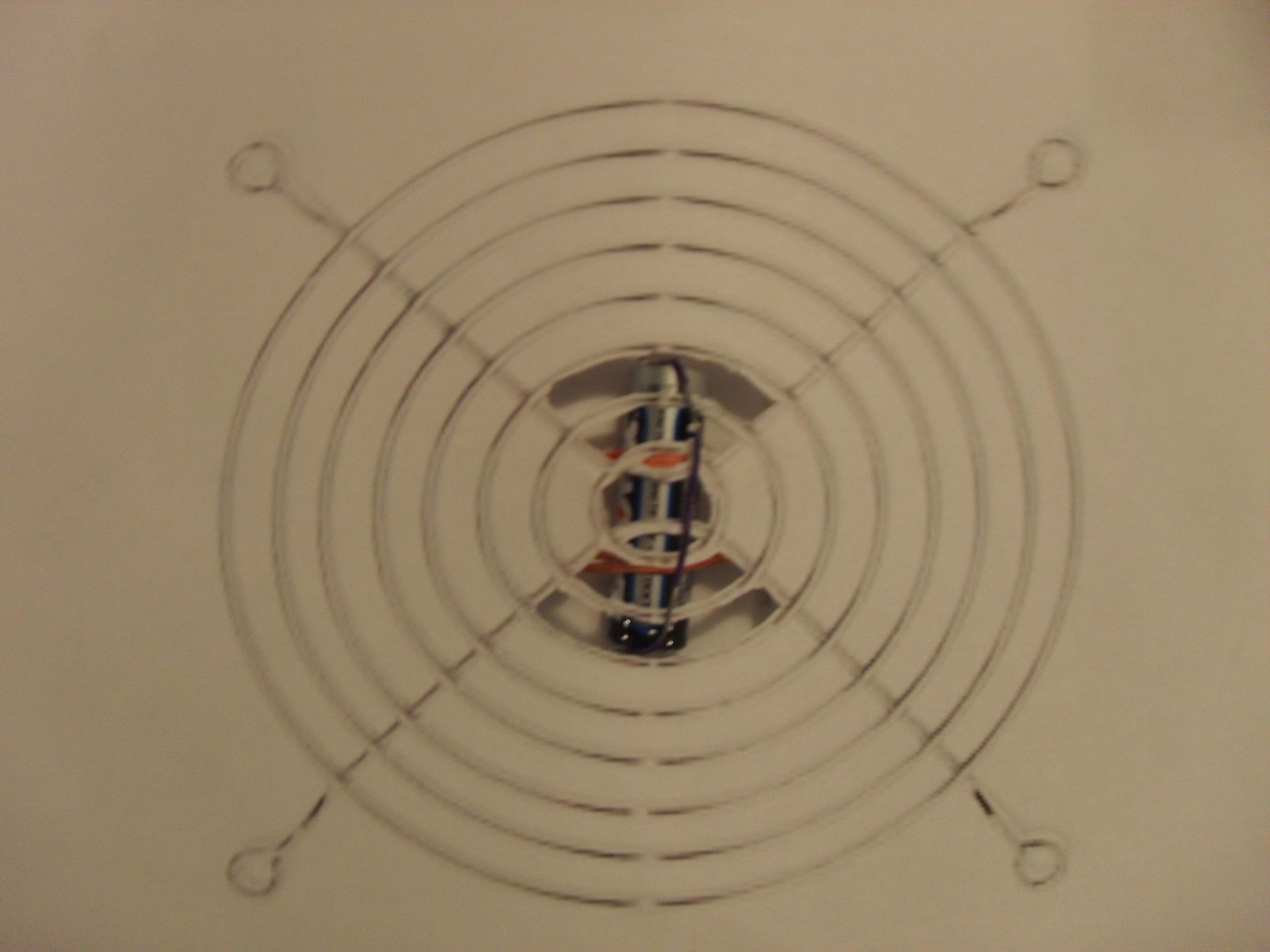 How to Make a Computer Fan Guard Stove!!! 4 Steps Instructables