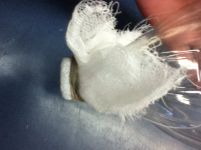 Take the Bottel Cap Off and Put Cheese Cloth.
