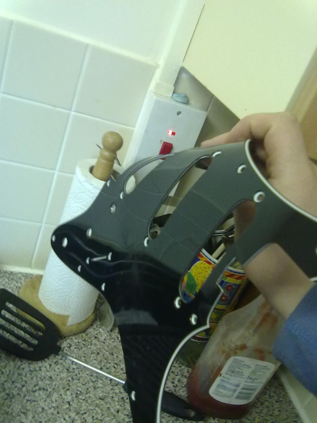 Unwarping Guitar Scratchplate
