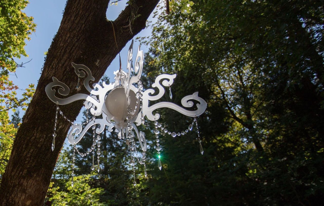 Nagelier: the chandelier that nags you to get off the couch