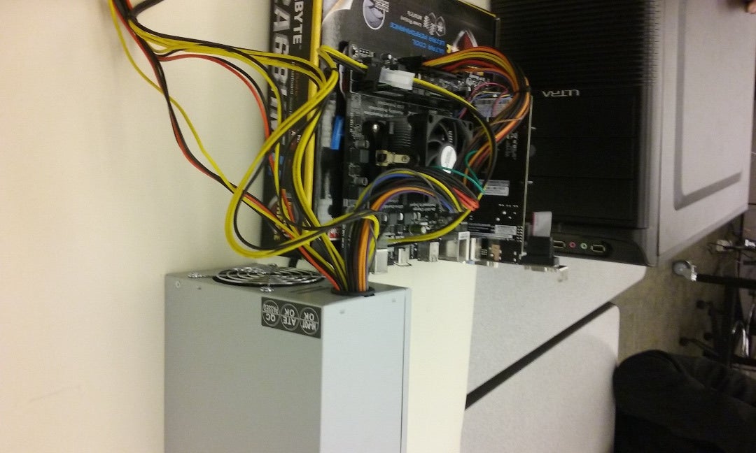 Step 5: Putting the Motherboard and Power Supply in the Case