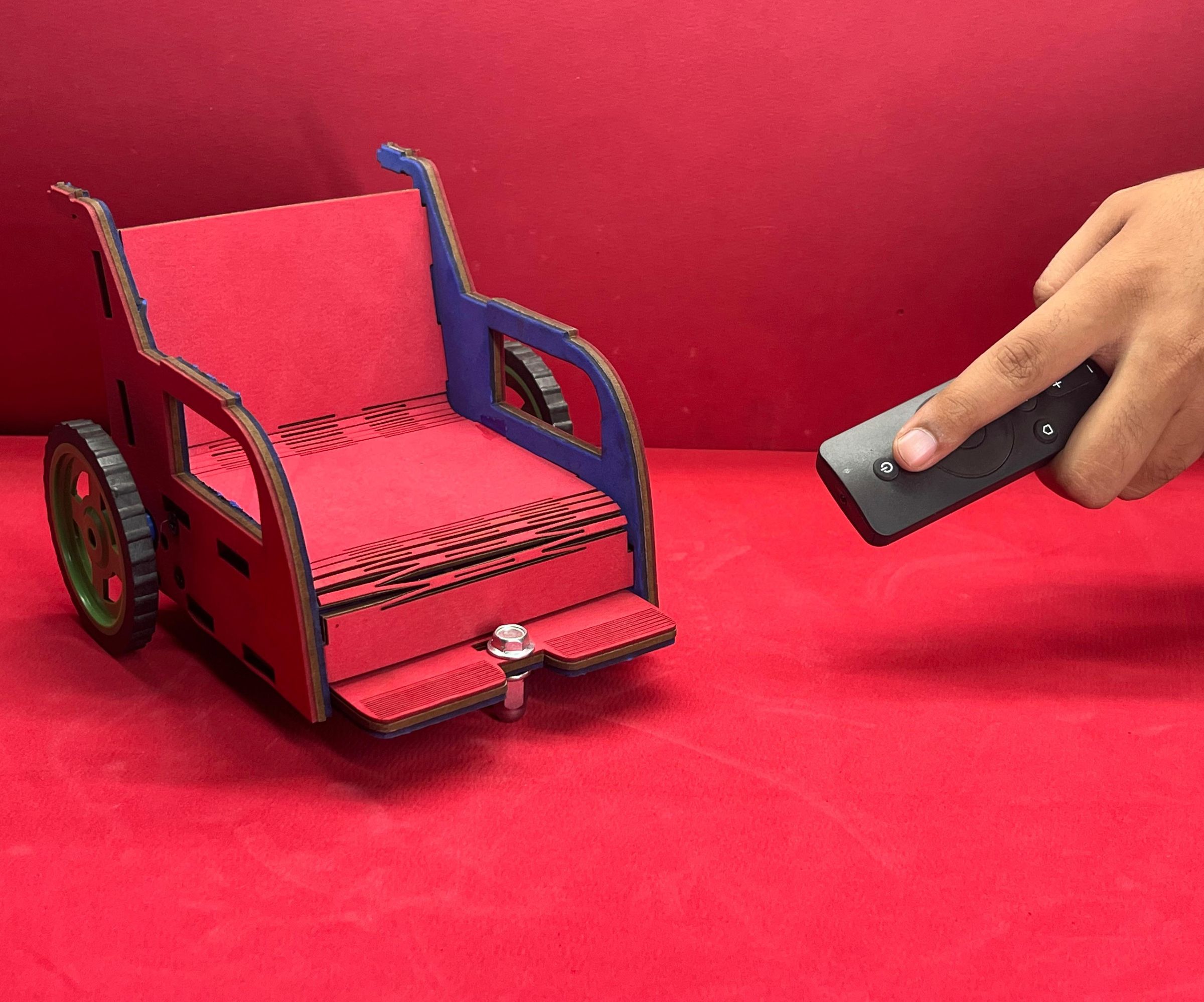 IR Remote Controlled Wheel Chair for Disabled Person