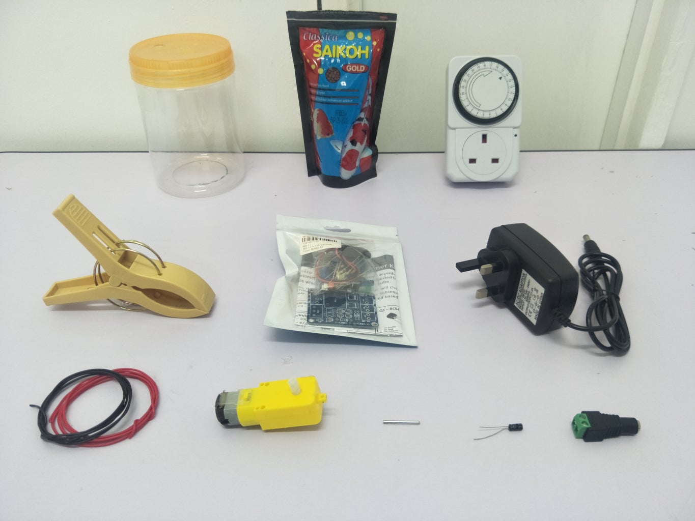 How to Make Simple and Low Cost Auto Fish Feeder Circuit Diagram