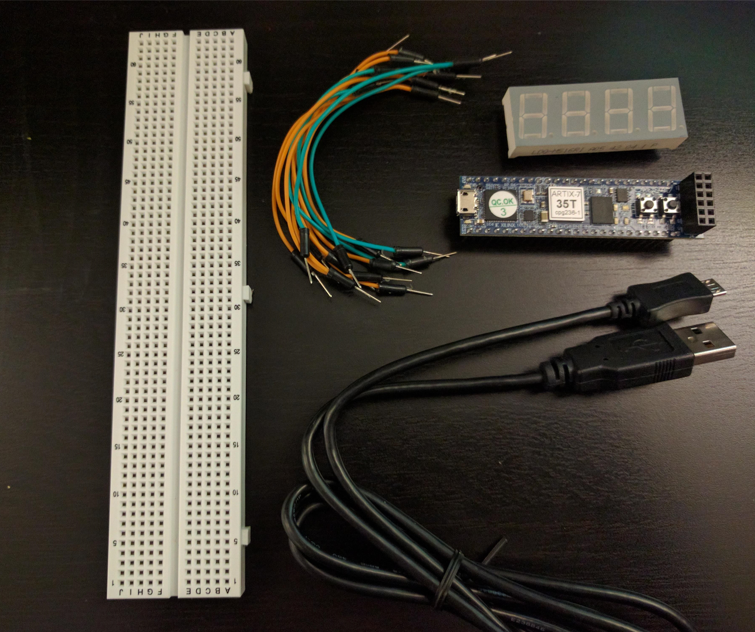 CmodA7 7-segment Stopwatch