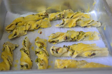 Beat the Egg Yolk and Apply Egg Wash on the Cookies.