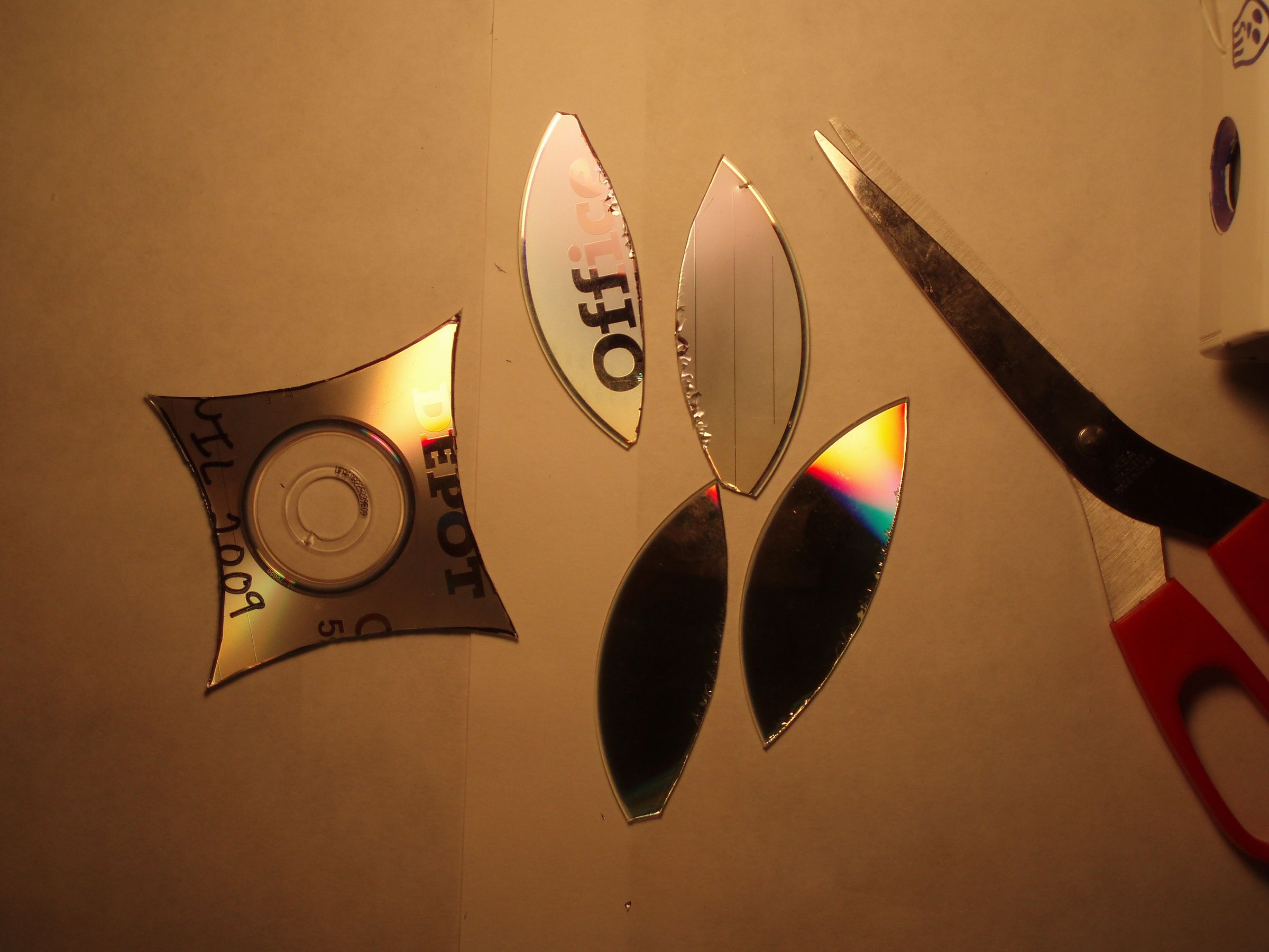How to Make a Ninja Star Out of a CD : 7 Steps - Instructables