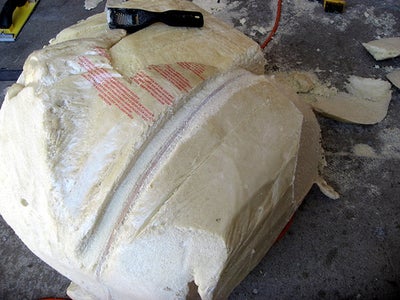 Hot Wire, Carve, and Shave Your Foam Block Down to a Curved Form.