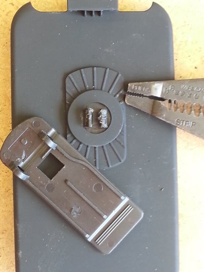 Dis-assembly of Holster, Game Boy, and Wiimote