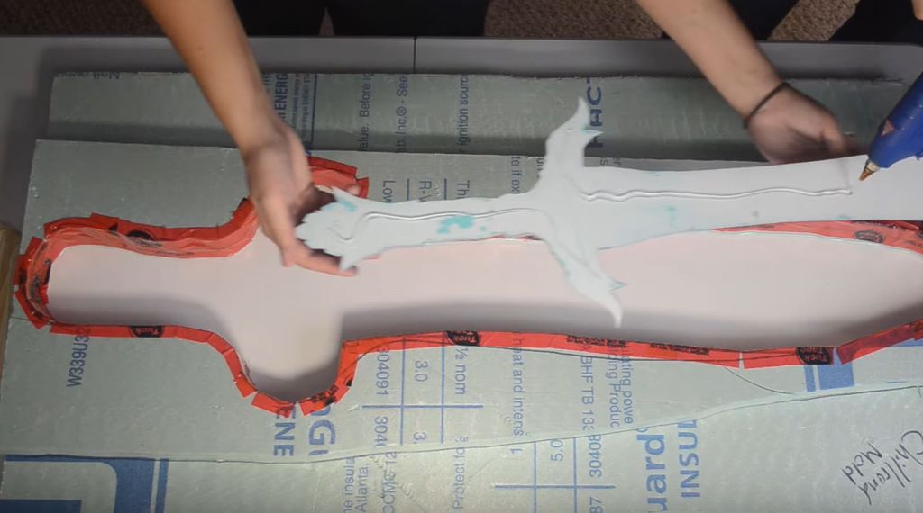 Picture of Hot Glue the Model Into a Mold Form