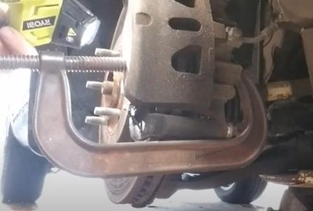 Compress Caliper and Remove