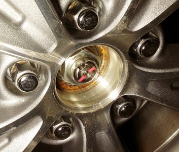 Install the Wheels and Torque the Axle Nut 