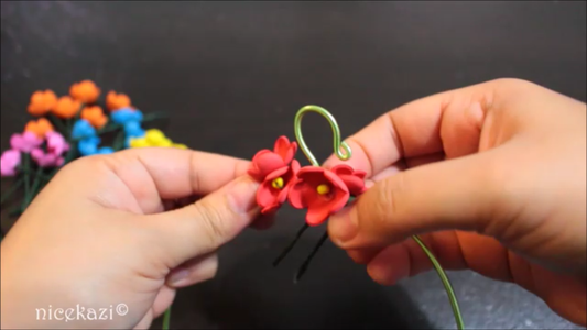 Wrapping the Swing With Flowers and Beads: