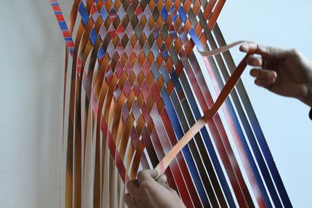 Attach Unnumbered Strips to Upper Right Bracket and Weave Through Other Strips