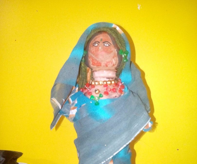  Black magic doll from bottle