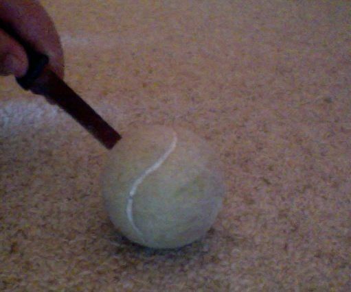 secret tennis ball compartment