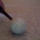 secret tennis ball compartment