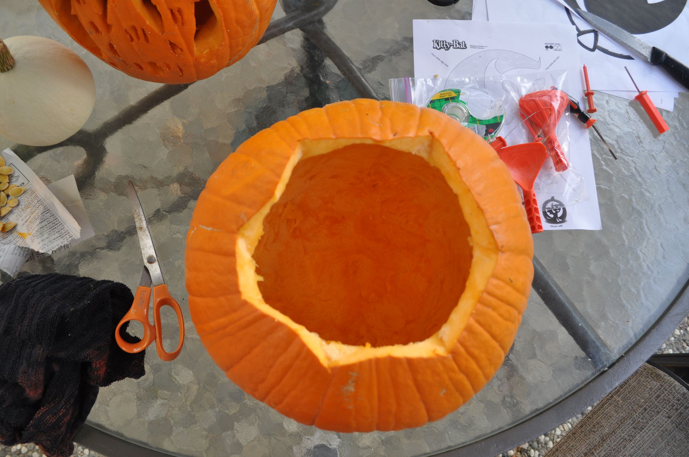 Carving my pumpkin with a design found on Google