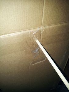 Step 2: Stick the Wood Pole Through Both Holes