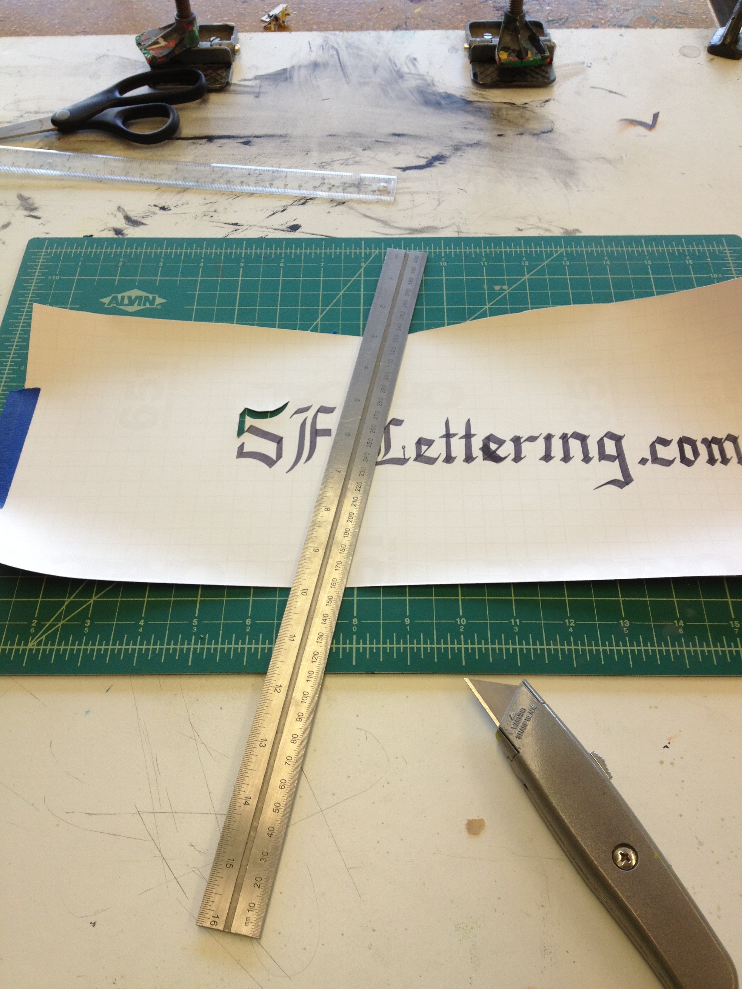 Hand Cut Vinyl Stencil Production and Modification for Silkscreen Printing