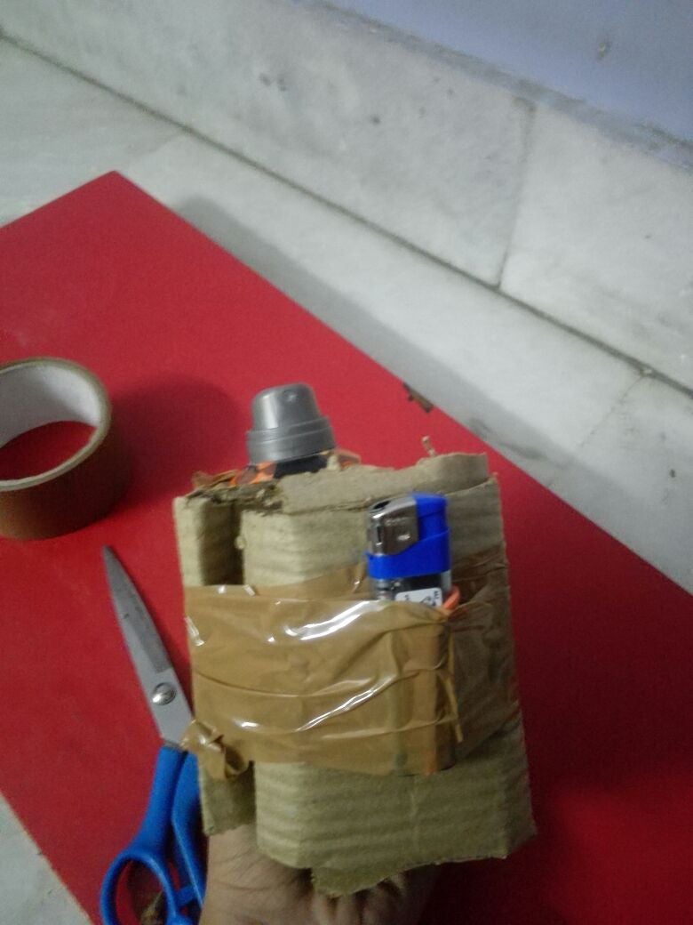 Attaching Lighter to the Cylinder...