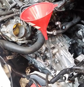 Fill the Transmission With HONDA Gear Oil. 