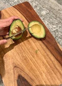 Separating the Avocado and Taking Out the Seed