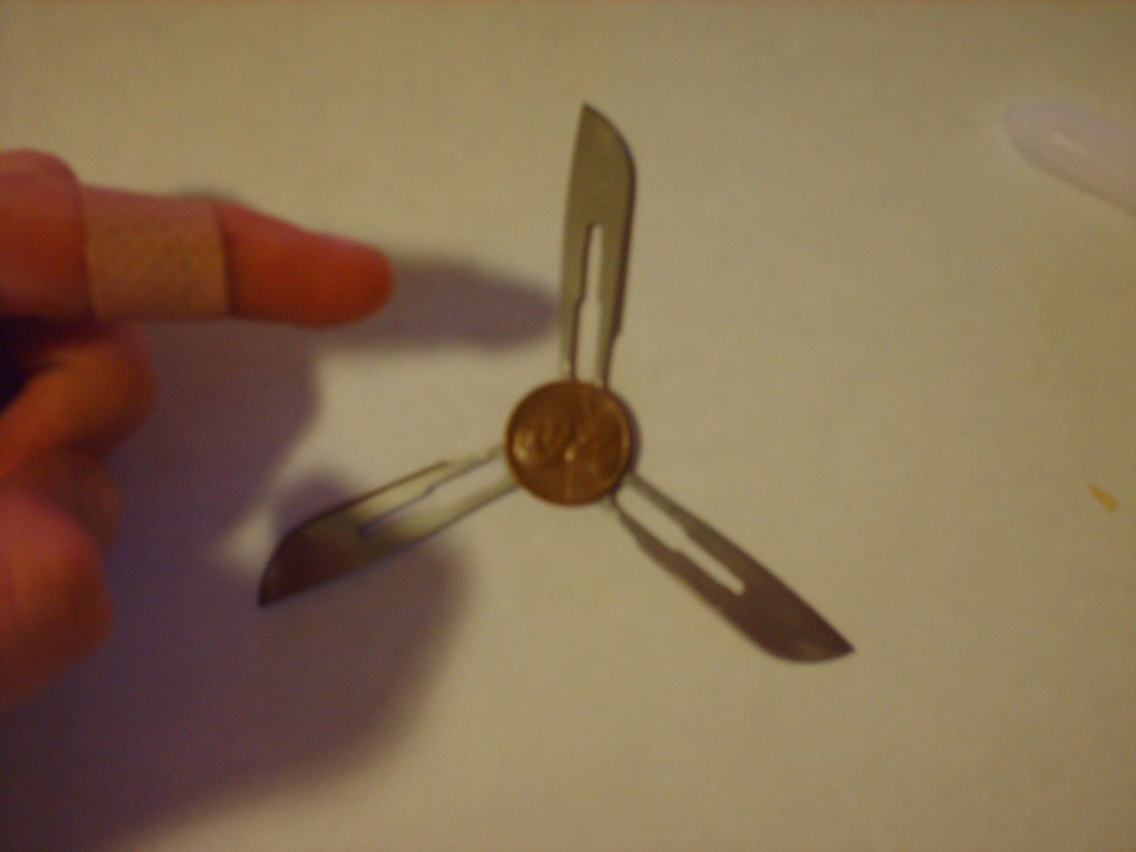 How to Make a Cheap Throwing Star :)