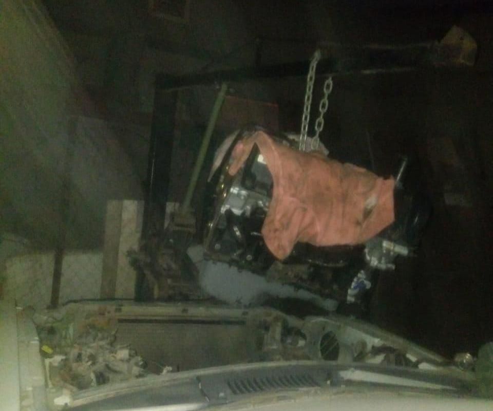 Engine Hoist With a Floor Jack