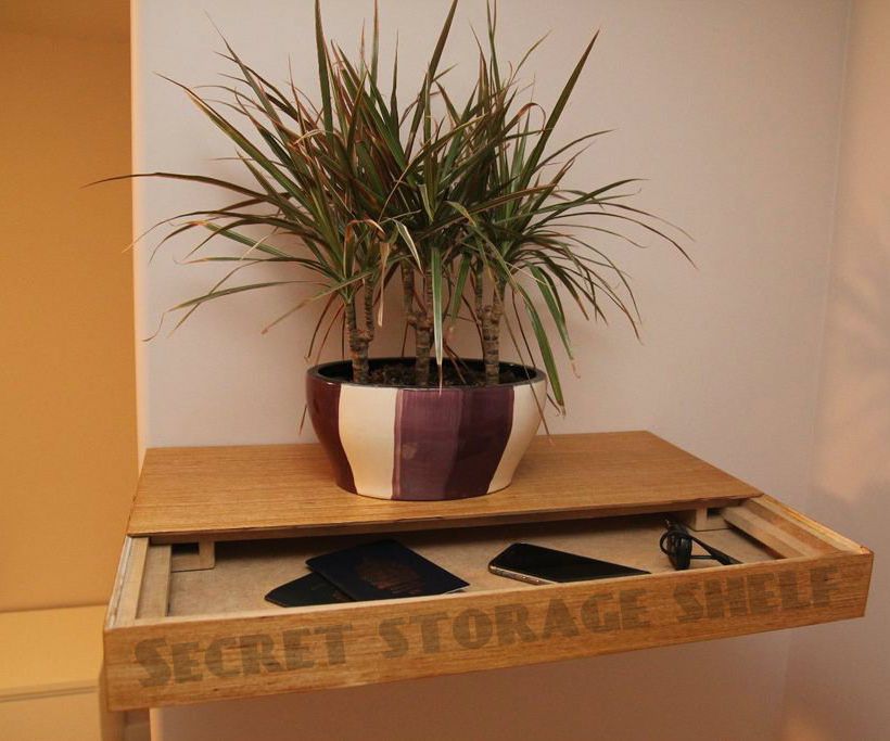 Secret storage wall shelf