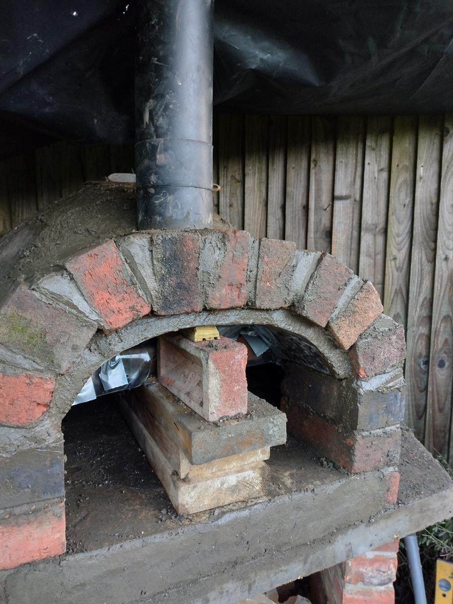 Incorporating the Chimney Flue and Building the Arched Opening