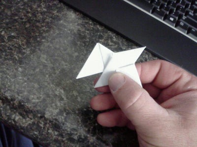 Fold the Ends Over Like Closing a Cardboard Box.  the Last One You Will Have to Go Over and Tuck Under