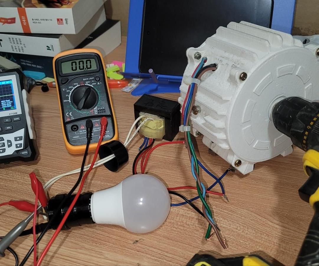 Making a Generator With a 3D Printer, Fan Motor, and Exercise Equipment Transformer