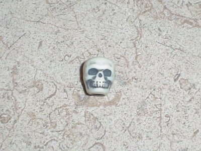 The Skully Button