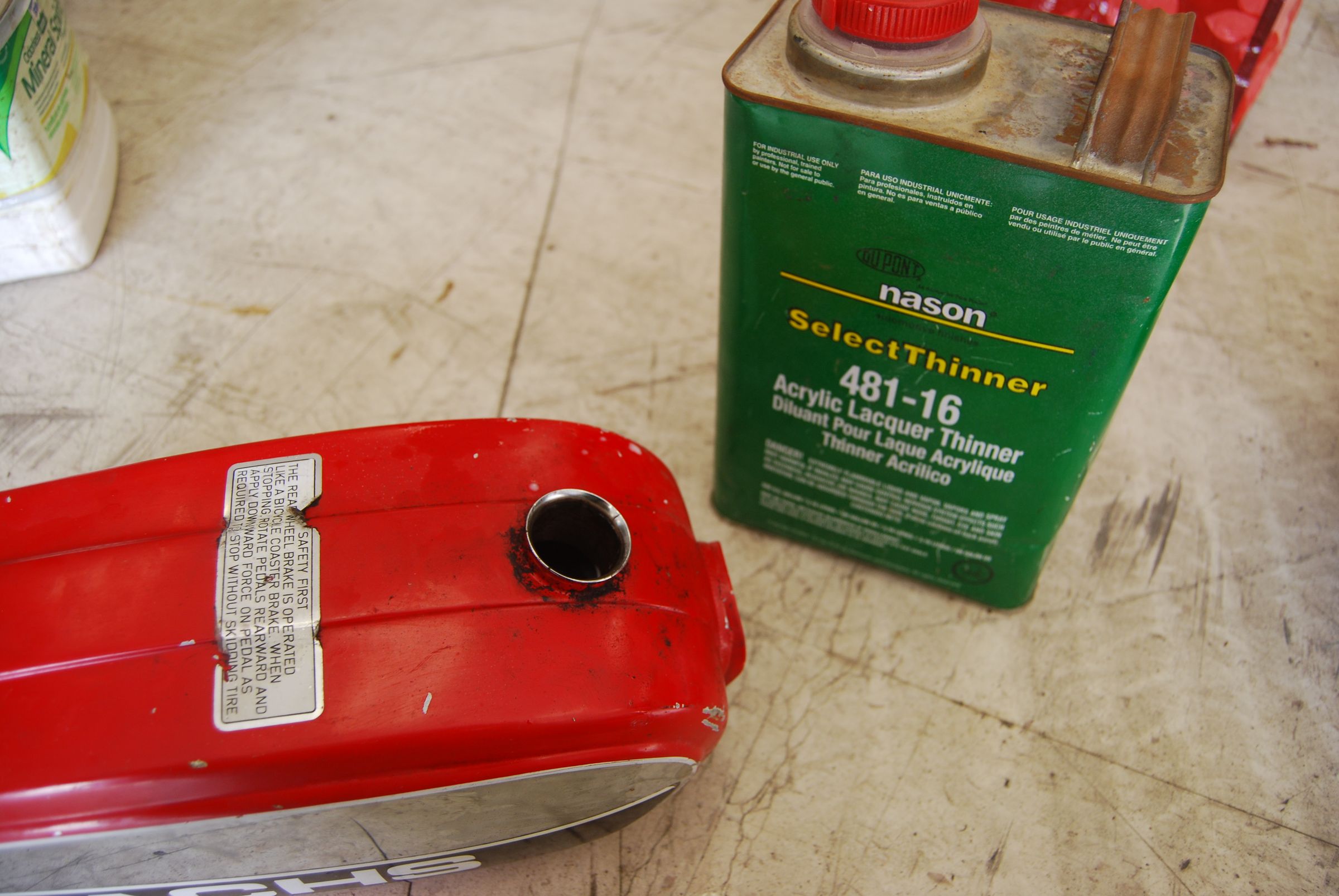 How to Clean Out a Rusty Gas Tank and Replace Oil on a Moped 4 Steps