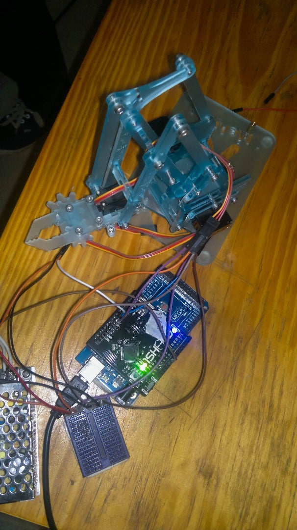 Controlling a Robotic Arm Using Arduino , 1Sheeld and an Android Smart Phone