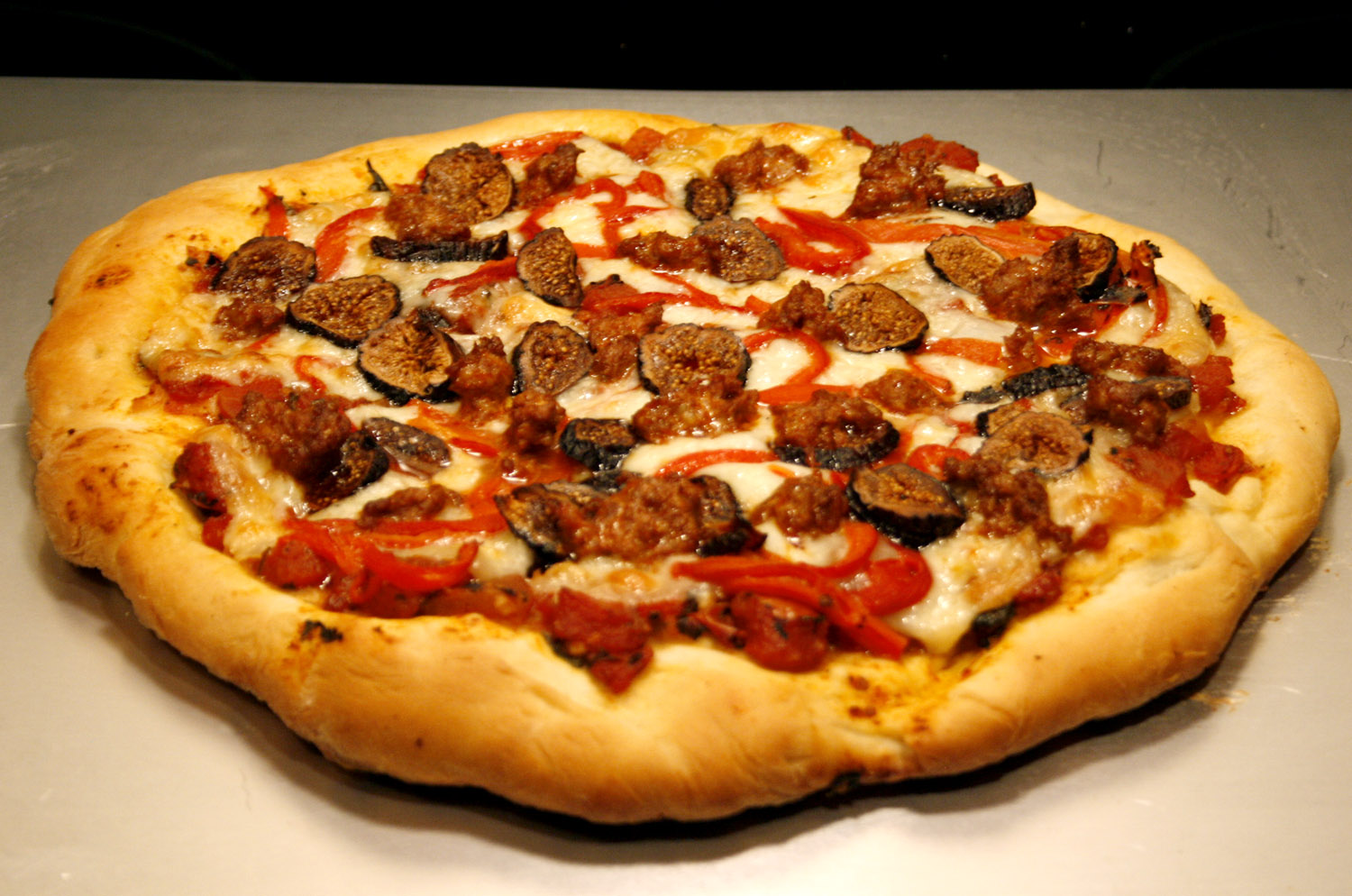 Spanish Inspired Pizza With Manchego, Chorizo, and Figs