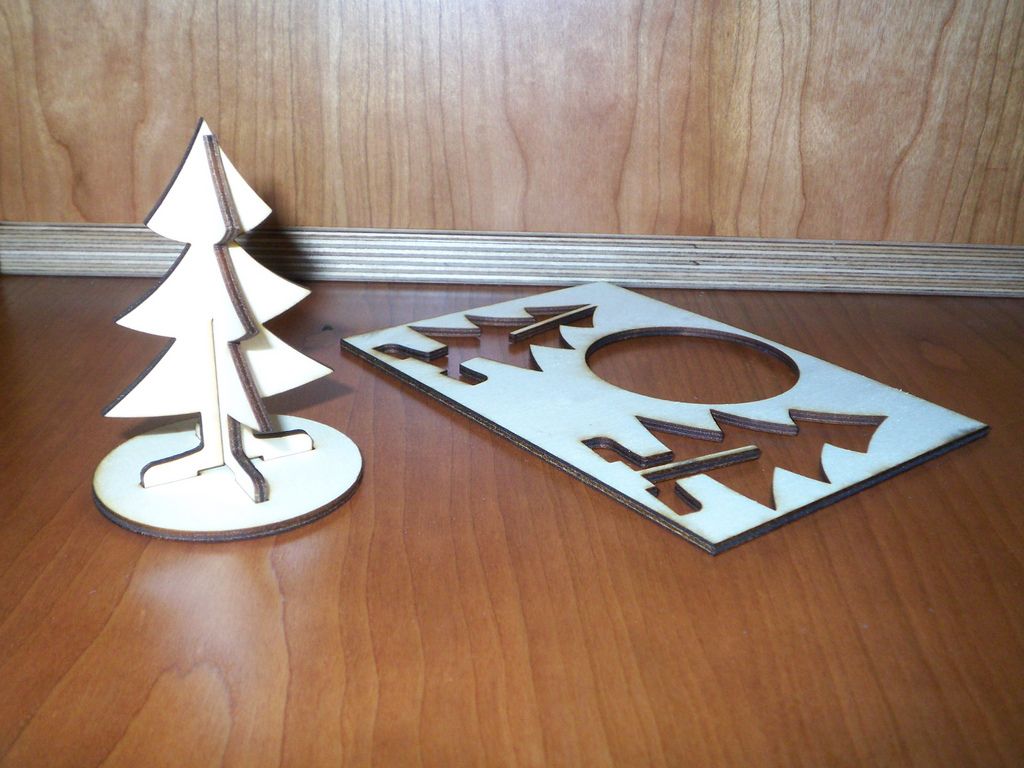 A Wooden Christmas Tree Sending in an Envelope