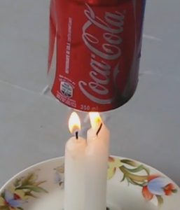 Tie the Thread to the Top of the Can and Hang It Over the Lit Candles