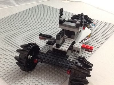 Attach the Cockpit and Weapons Rack