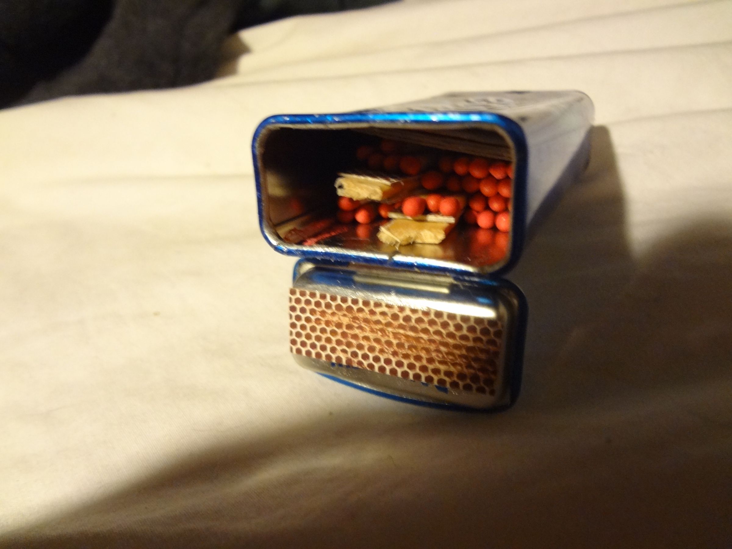 How to Make a Water Proof Match Box From a Mint Tin