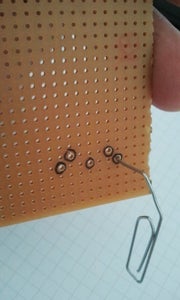 Enlarging the Holes of a Perfboard - Mac Gyver Style