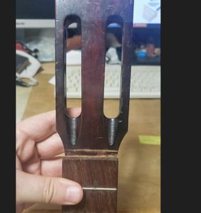 Reattaching the Headstock