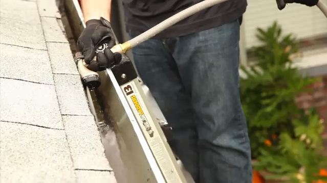 How to Clean Your Gutters and Downspouts - Build.com 30 Sec Tip