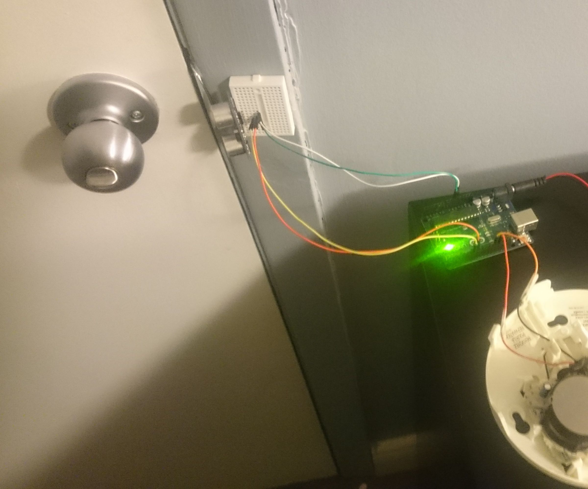 HC-SR04 Based Door Unlock Detection System 