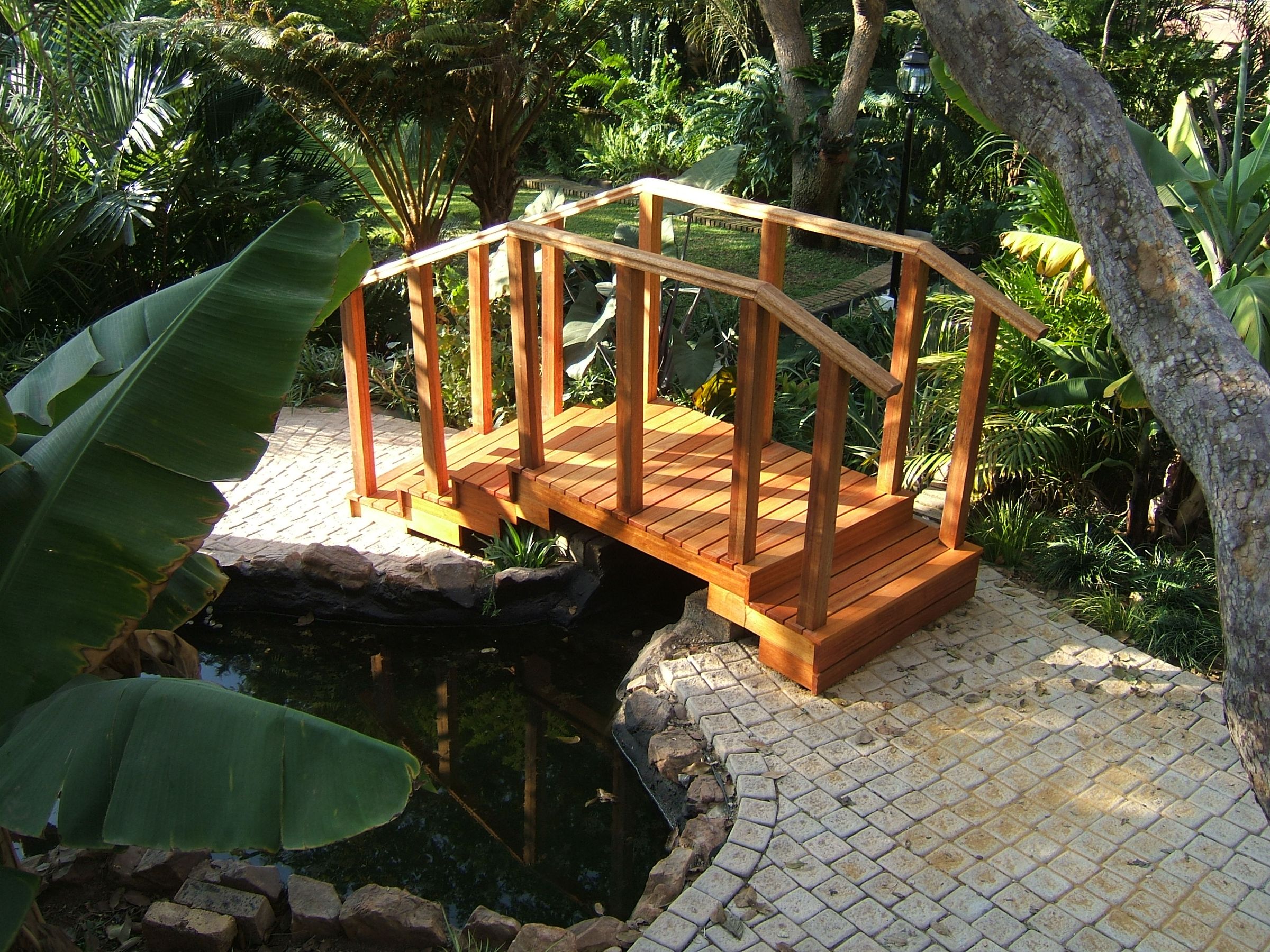 Steel frame wooden bridge