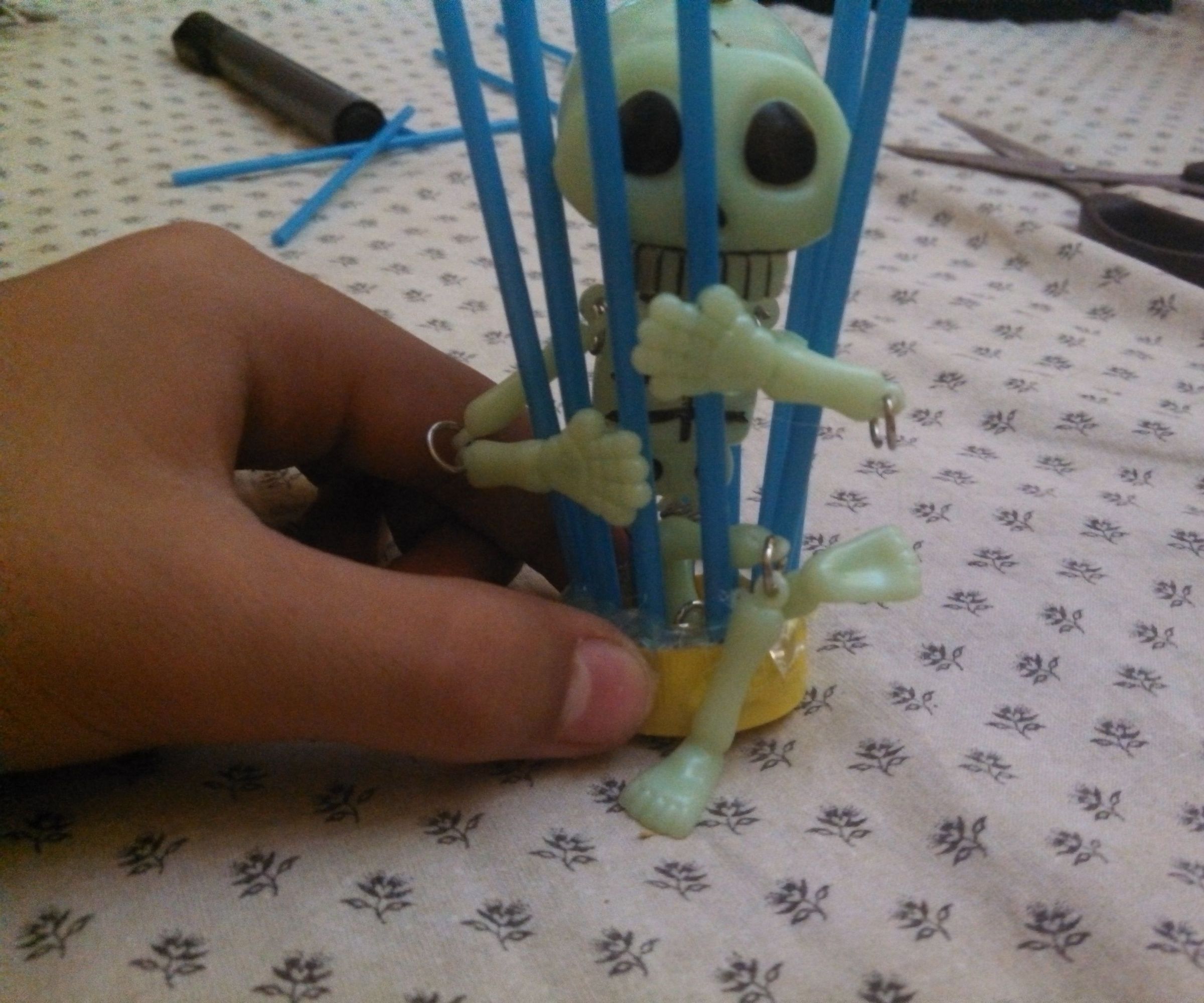 Make a Skeleton in a Cage Décor for Your Fish Tank ( Halloween )