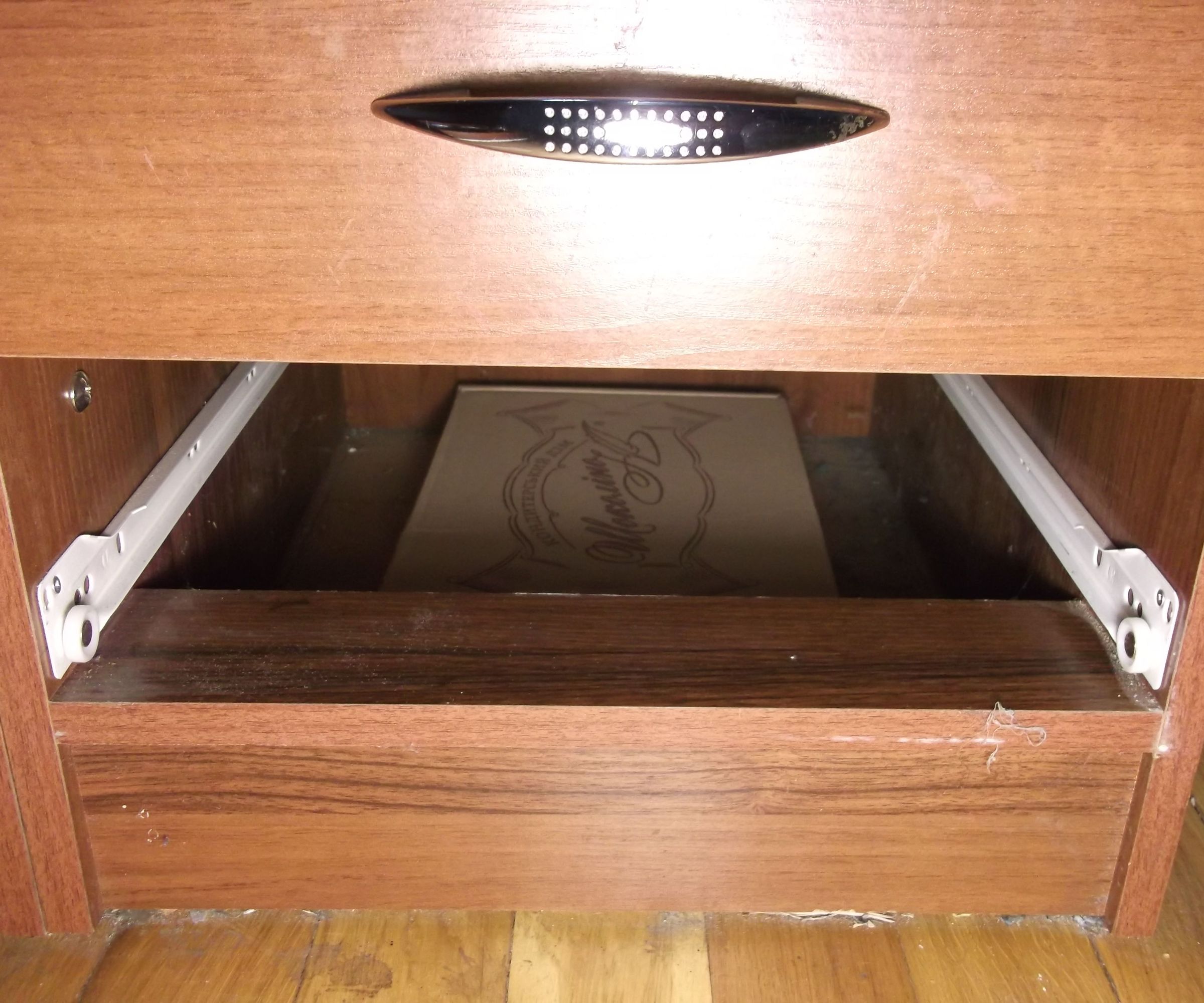 Under the Bottom Drawer Hiding Place