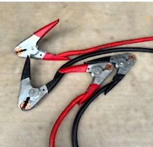 Jump Starting a Vehicle Using Jumper Cables and Another Vehicle