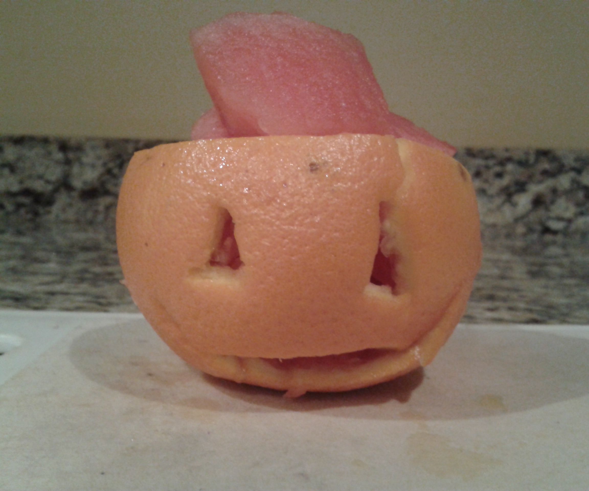 Jack-o-lantern fruit cups!