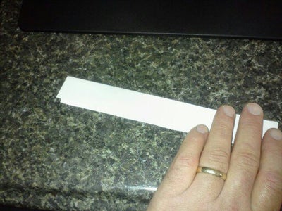 Take the Leftover, Fold in Half and Pull Apart.  Cut If Scissors Are Available